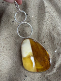 Mosaic Amber Pendant with Decorative Silver Circles
