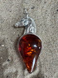 Pendant with Silver Horse Head and Cognac Amber